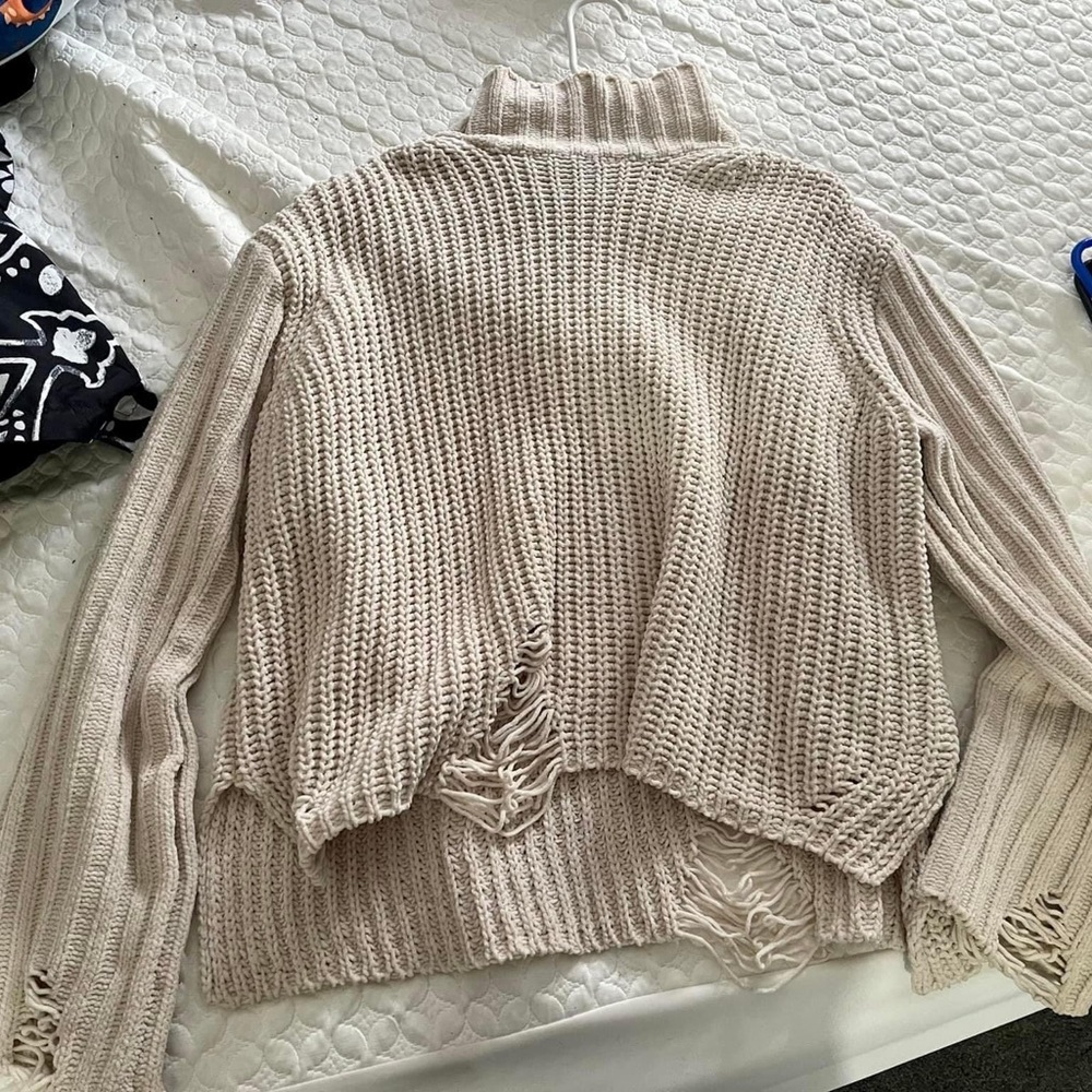 Distressed turtle neck